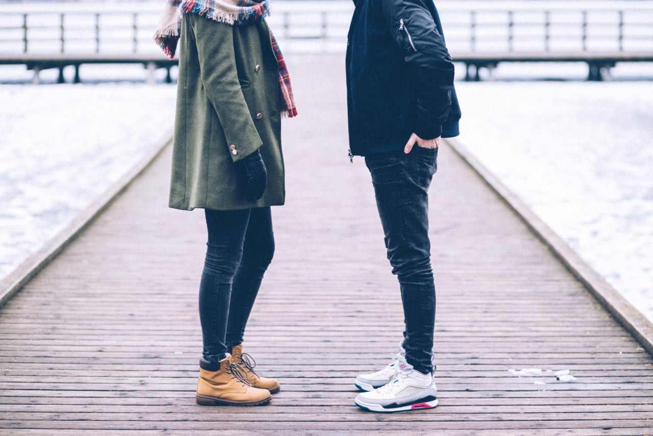 two_people_standing_on_the_pier.jpg